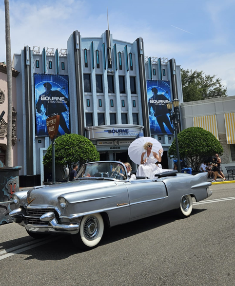 Marilyn sitting in a car