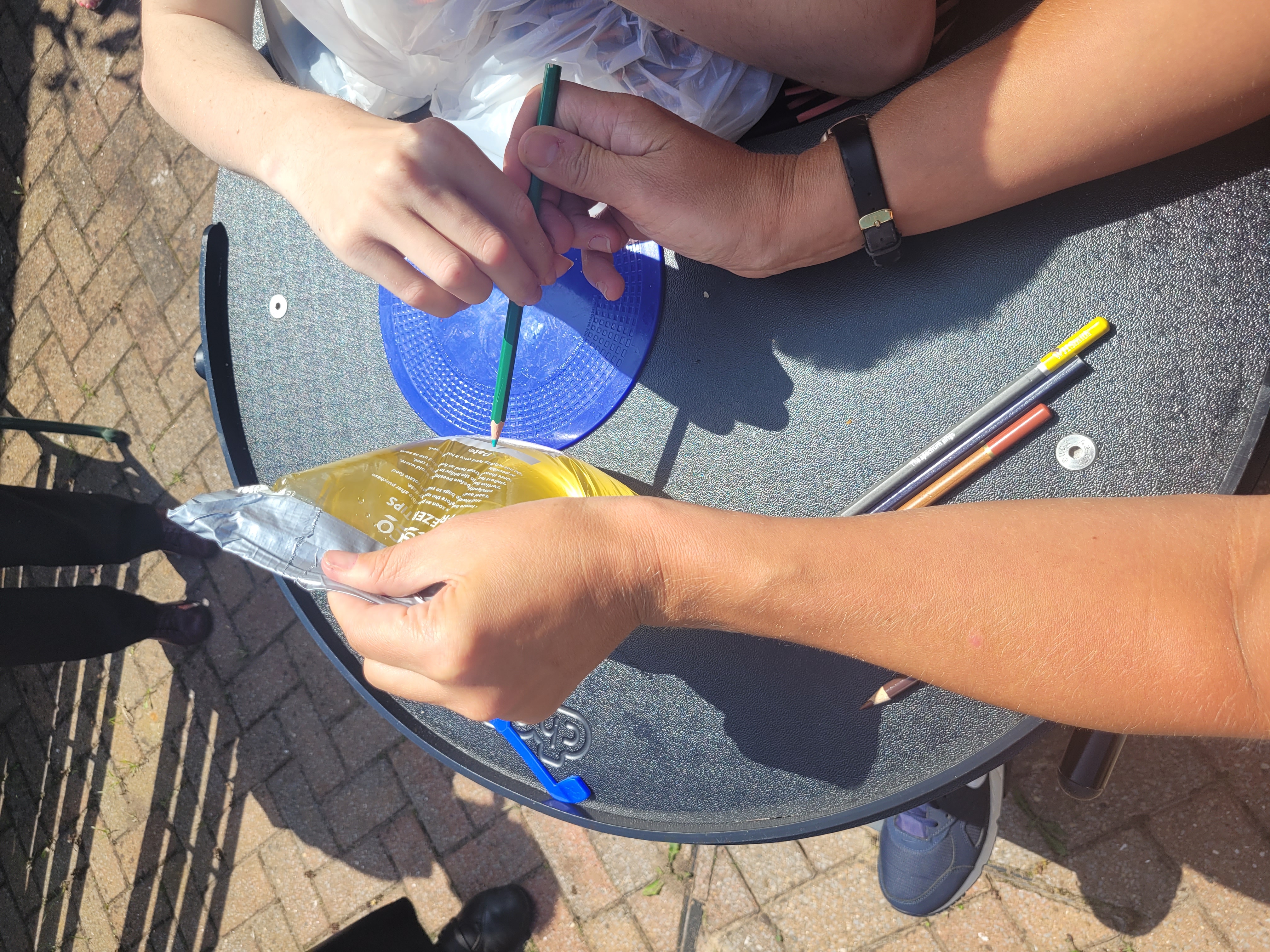 pencil through a bag